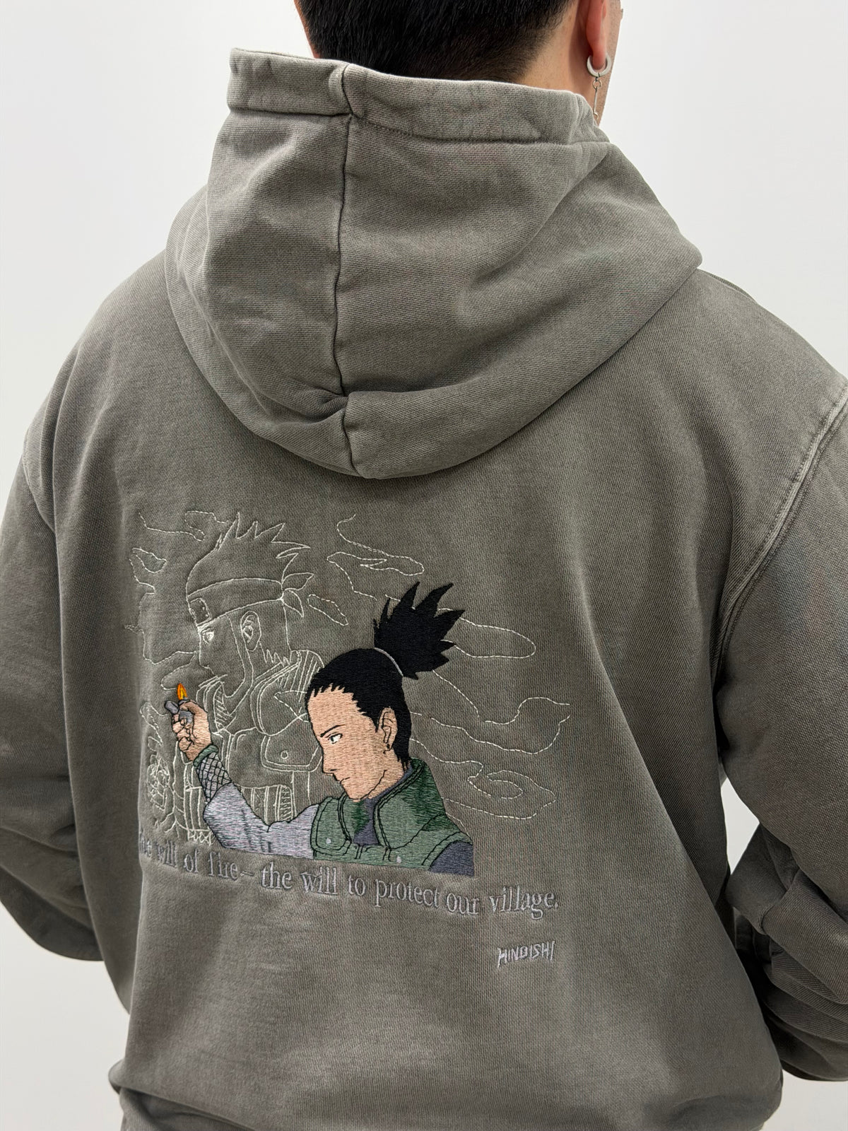 Close-up of back embroidery: Shikamaru with Asuma's lighter and an outline of Asuma, Naruto anime streetwear