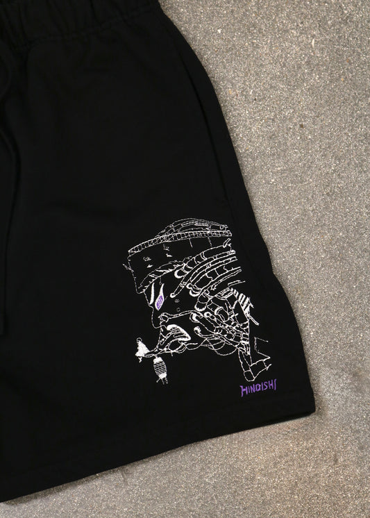 Close-up of the Pain-Amegakure Deity shorts: white line-art embroidery of Pain with a purple Rinnegan eye