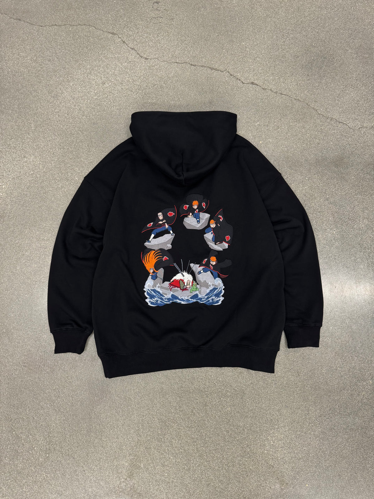 The Last Message black hoodie laid flat, back view with embroidered Jiraiya vs Pain battle scene